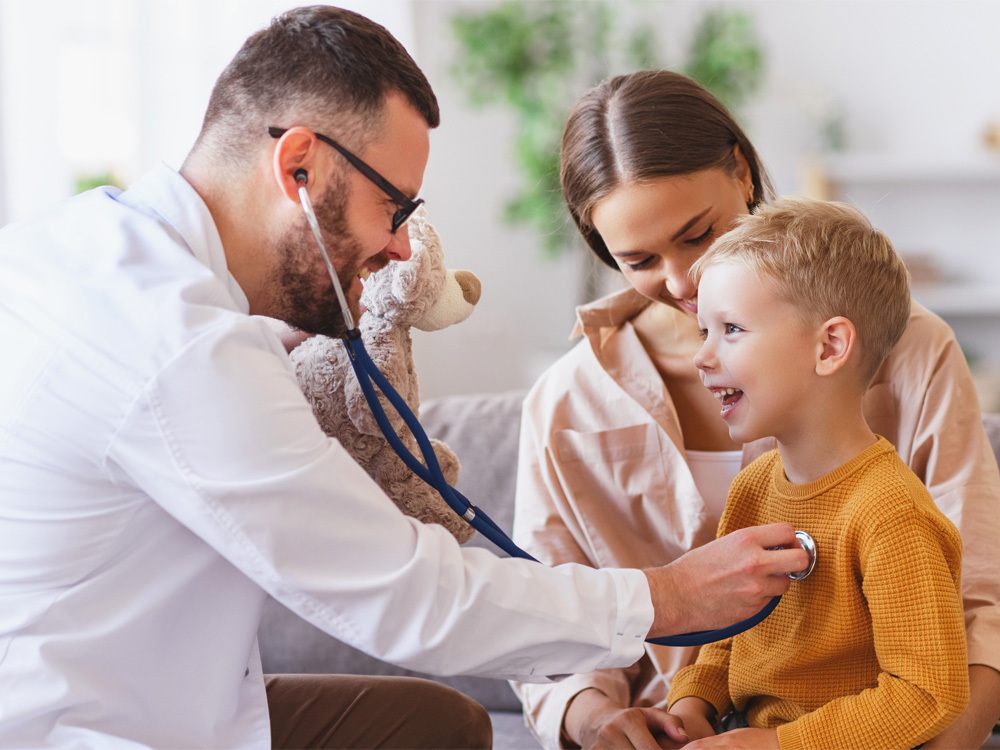Provider with young boy and mother.